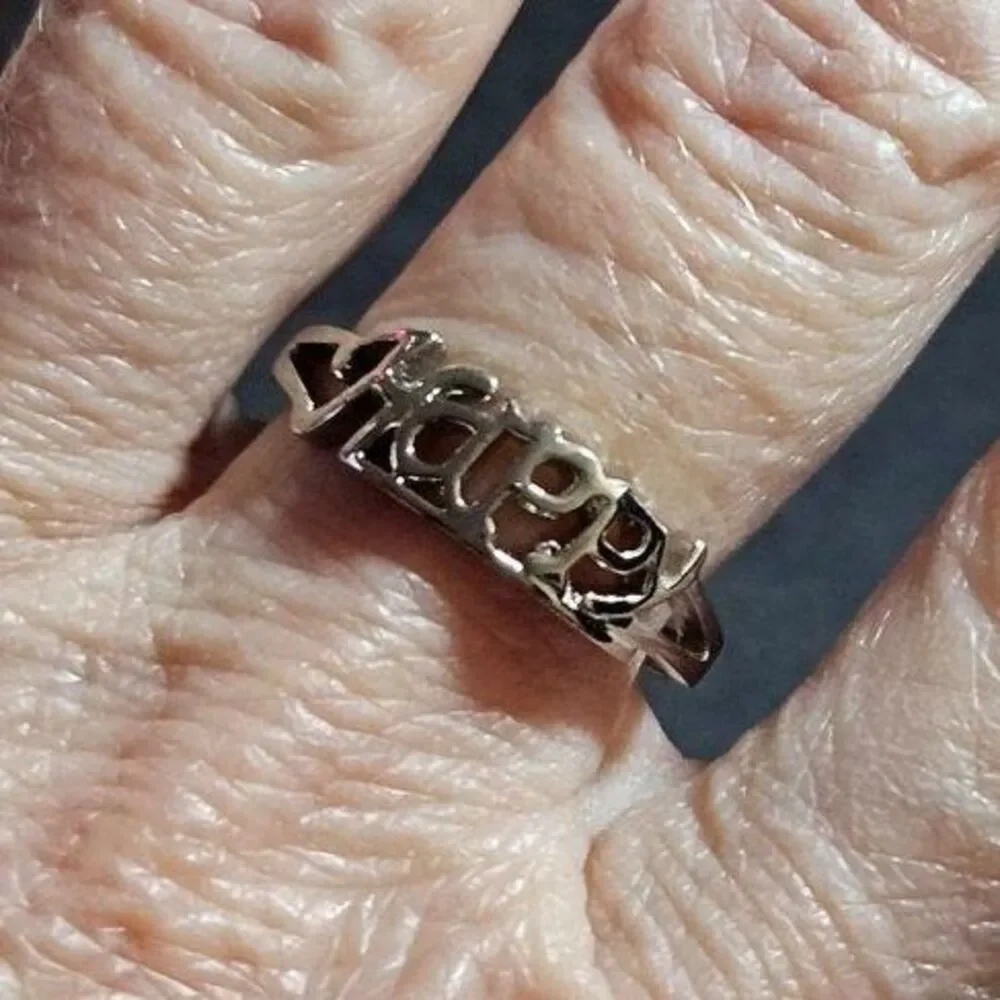 Silver tone happy ring size 8